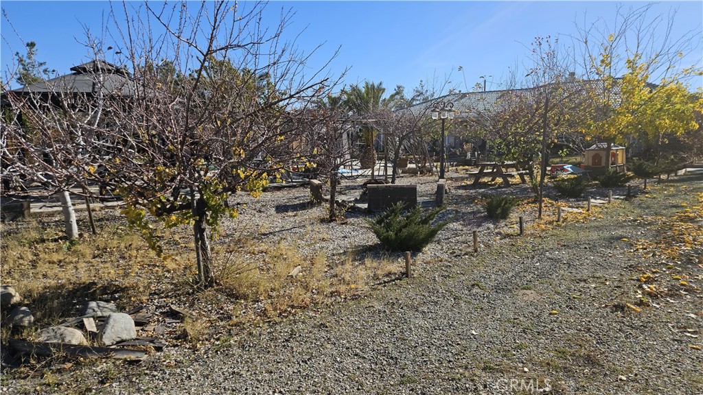 15274 Rodeo Street Hesperia, CA 92345 - Photo 16 of 43 a view of a backyard of the house