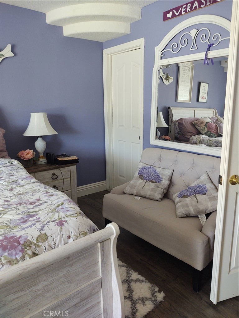 15274 Rodeo Street Hesperia, CA 92345 - Photo 34 of 43 a bedroom with a bed and a dresser in it
