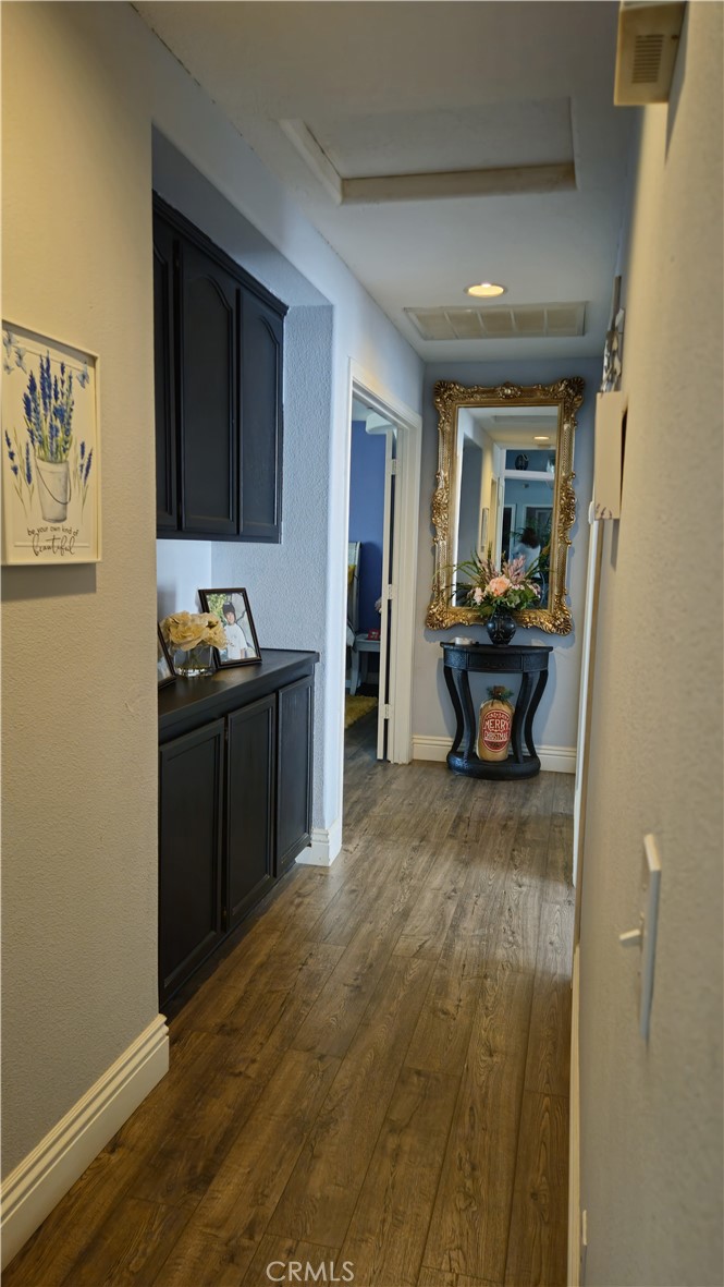 15274 Rodeo Street Hesperia, CA 92345 - Photo 36 of 43 a living room with furniture and a wooden floor
