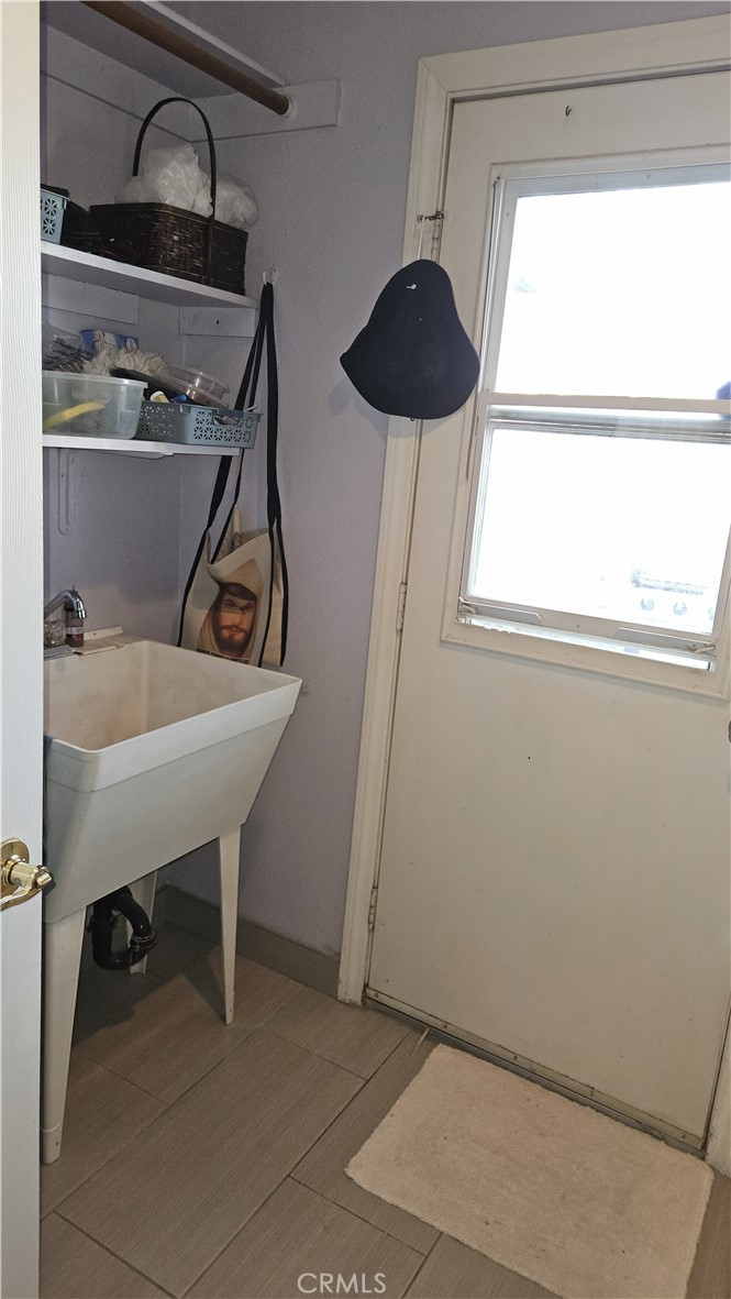 15274 Rodeo Street Hesperia, CA 92345 - Photo 43 of 43 a room with a sink and a window