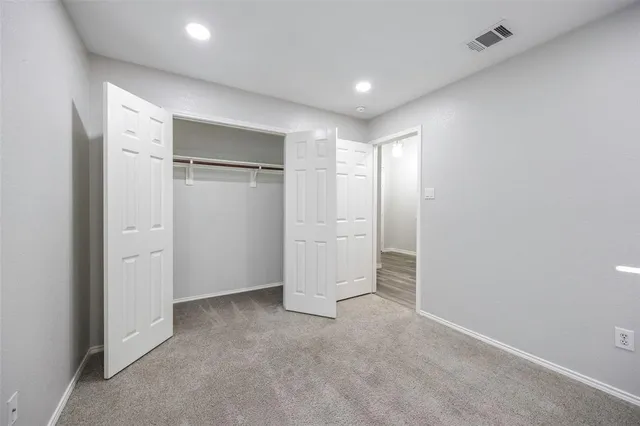 a open kitchen with kitchen island a sink stainless steel appliances and cabinets