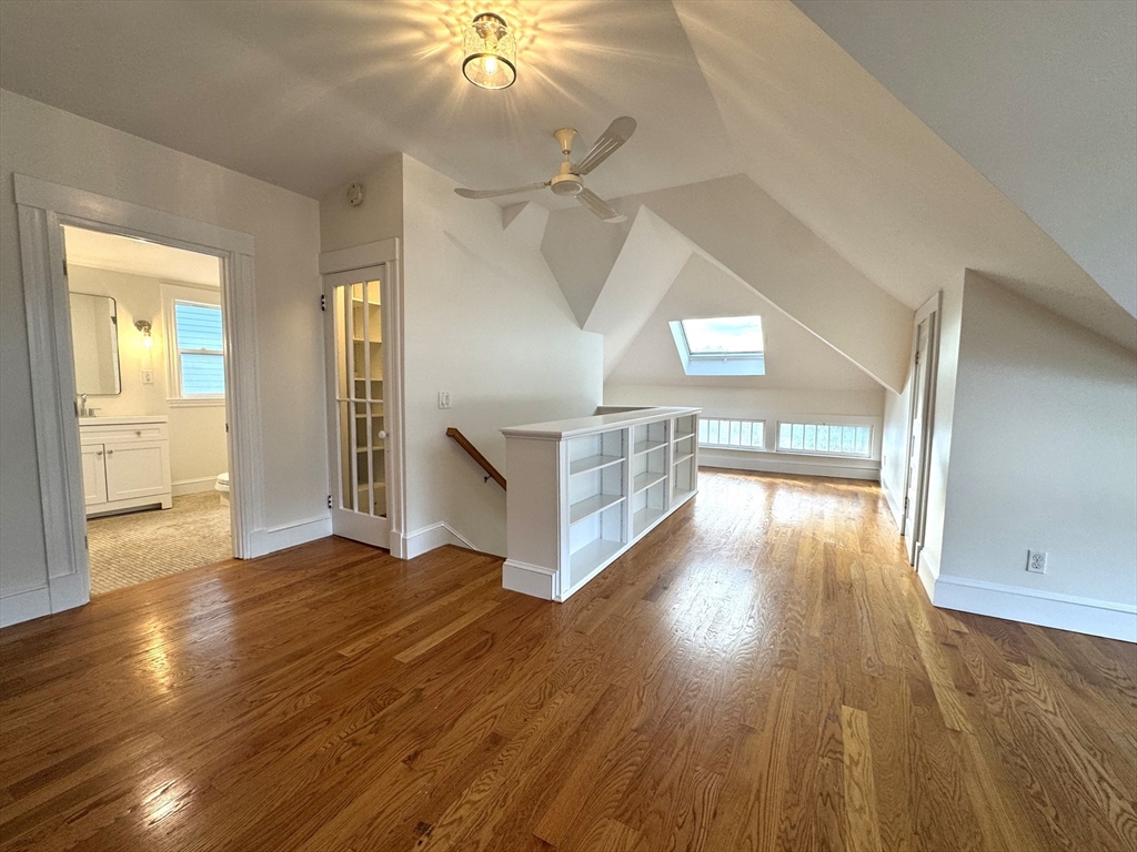 14 Breck Avenue, Unit 2 Boston, MA 02135 - Photo 20 of 26 wooden floor in an empty room with a window