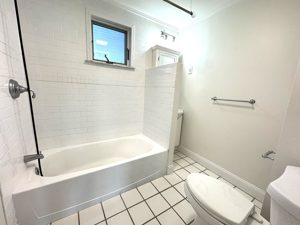 14 Breck Avenue, Unit 2 Boston, MA 02135 - Photo 25 of 26 a bathroom with a vanity and a toilet