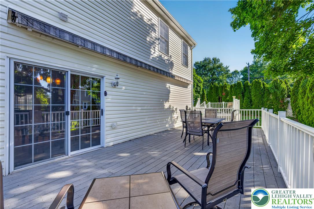 1702 Red Bud Road Quakertown, PA 18951 - Photo 61 of 68 An inviting wood deck provides a serene outdoor living space, perfect for relaxation and entertaining.