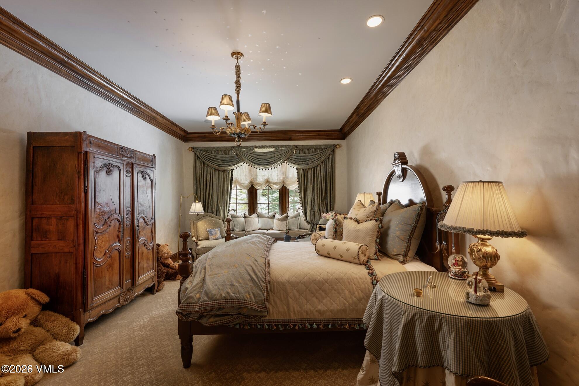677 Pilgrim Drive Edwards, CO 81632 - Photo 40 of 64 a bed room with a bed and a mirror