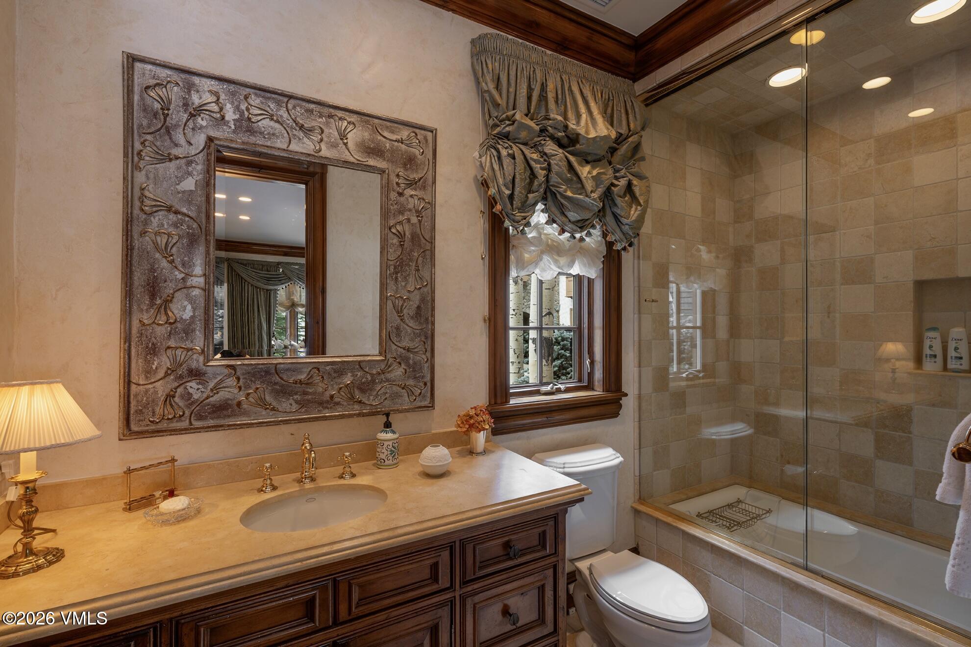 677 Pilgrim Drive Edwards, CO 81632 - Photo 41 of 64 a bathroom with a sink a toilet and shower