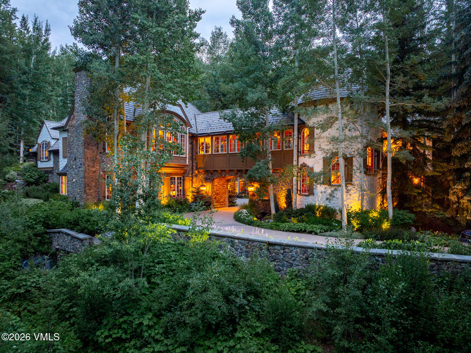677 Pilgrim Drive Edwards, CO 81632 - Photo 58 of 64 an aerial view of a house with a yard and large trees
