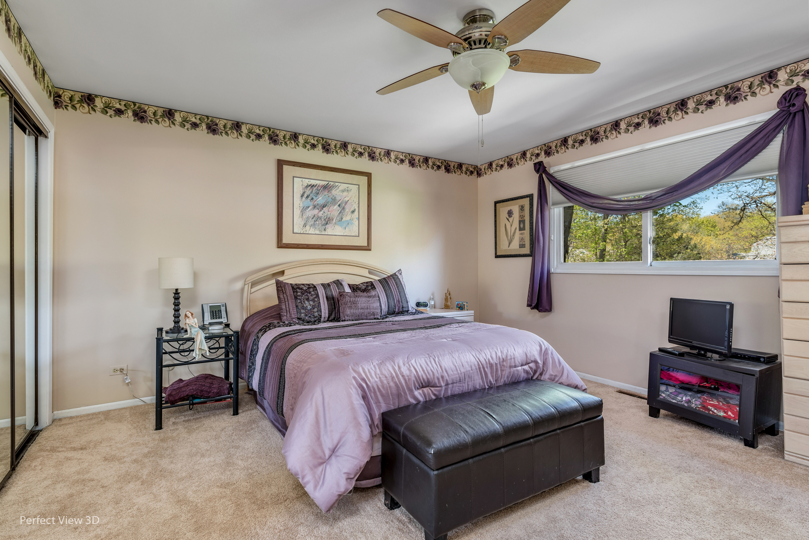 586 Siems Circle Roselle, IL 60172 - Photo 14 of 25 a bedroom with bed and a chandelier