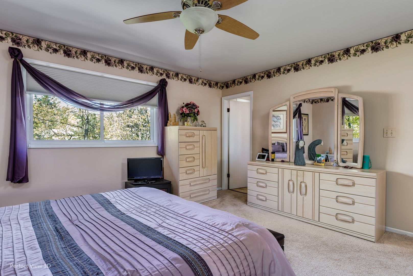 586 Siems Circle Roselle, IL 60172 - Photo 15 of 25 a bedroom with a bed dresser and a window