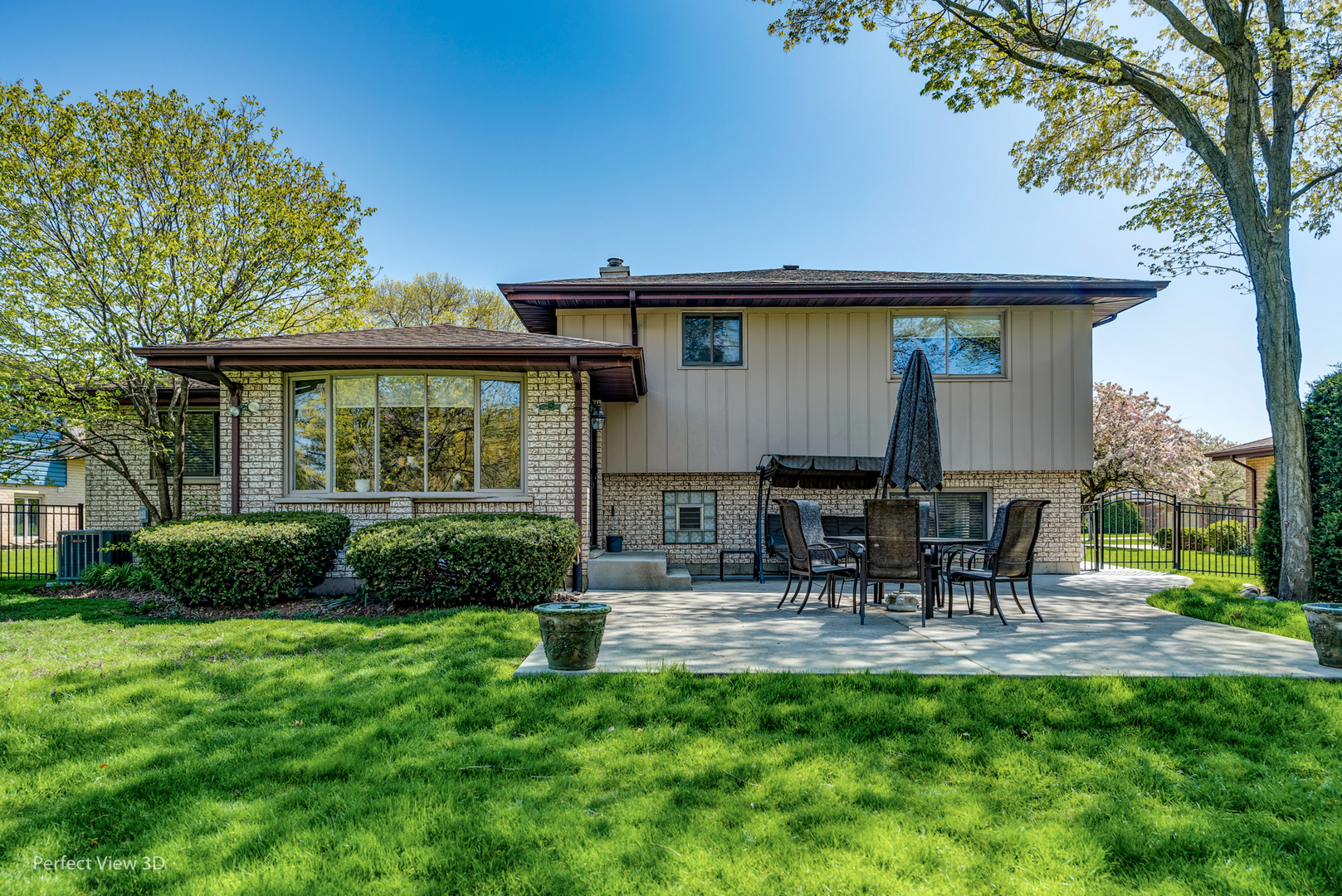 586 Siems Circle Roselle, IL 60172 - Photo 24 of 25 a front view of a house with patio and garden