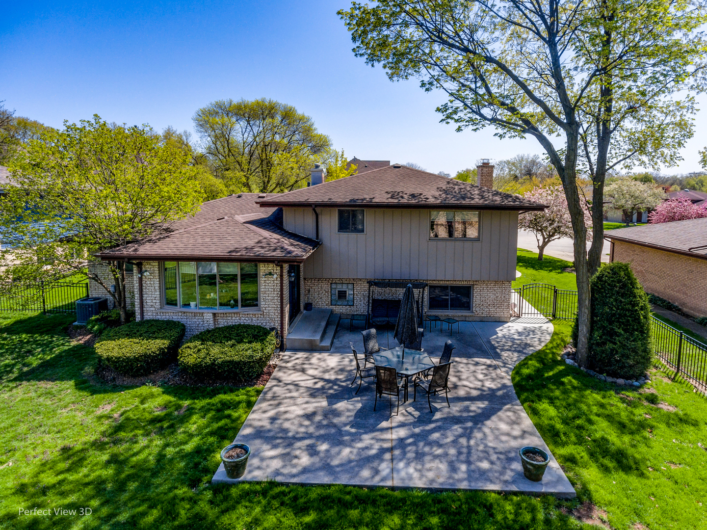 586 Siems Circle Roselle, IL 60172 - Photo 25 of 25 a view of a house with backyard garden and sitting area