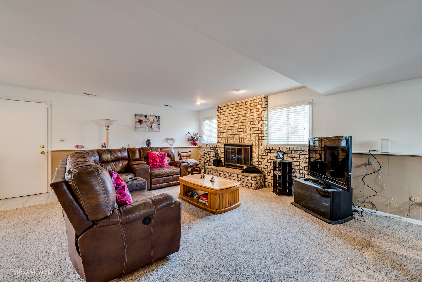 586 Siems Circle Roselle, IL 60172 - Photo 9 of 25 a living room with furniture and a flat screen tv
