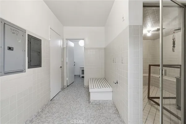a bathroom with a tub and a sink