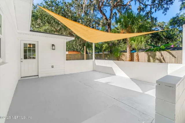 a view of backyard with green space