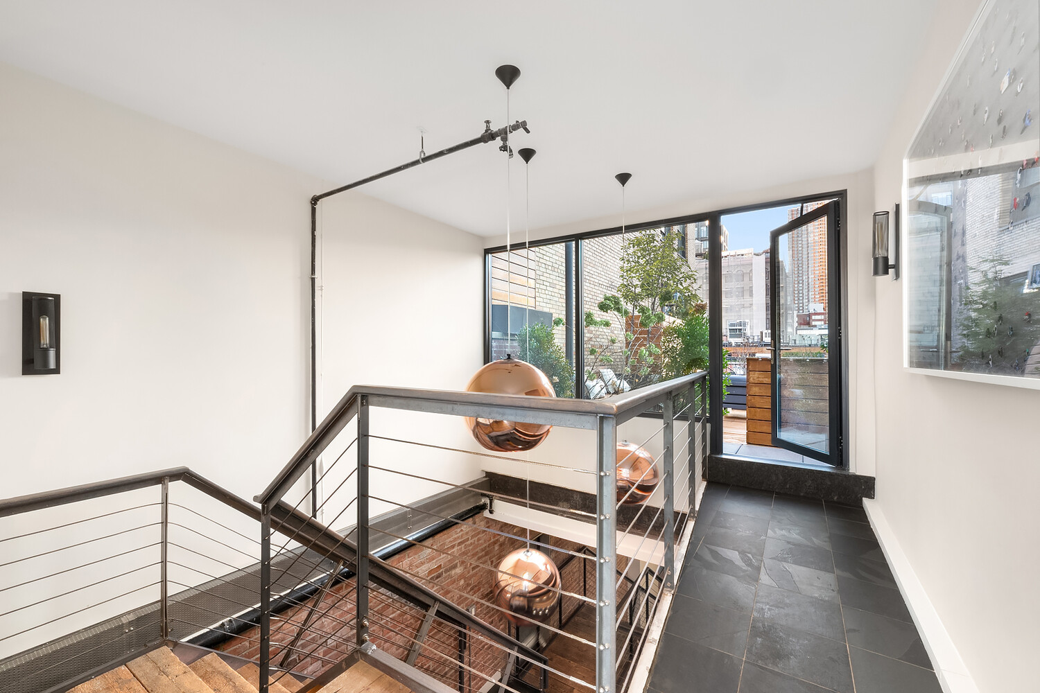 58 Walker Street, Unit PH Manhattan, NY 10013 - Photo 8 of 18 a view of an entryway with wooden floor