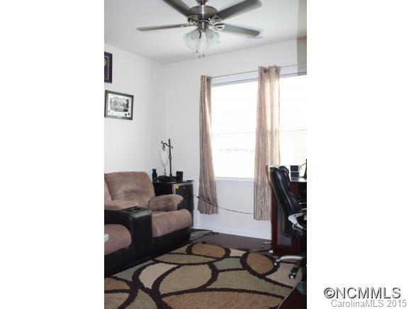 277 Roanoke Road Fletcher, NC 28732 - Photo 9 of 24 a living room with furniture and a window