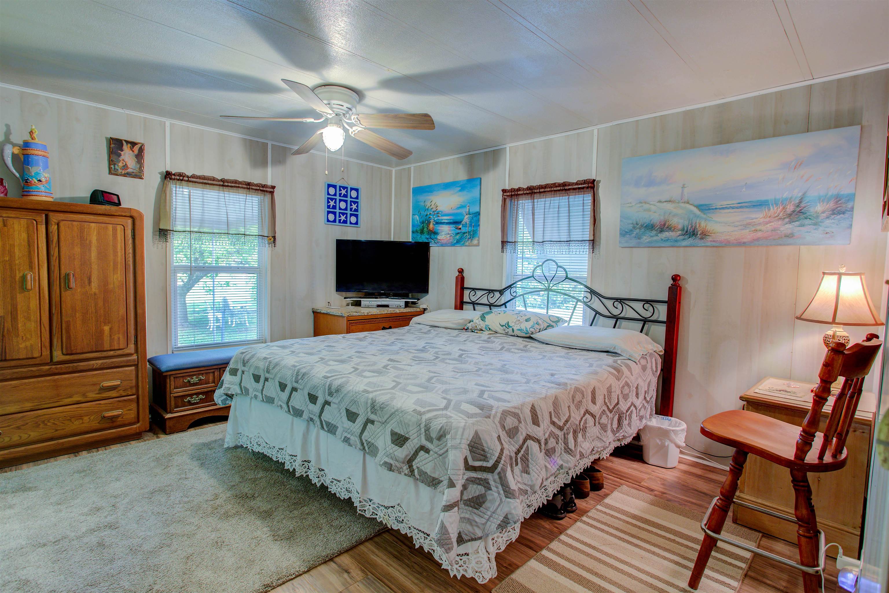736 San Mateo Road Satsuma, FL 32189 - Photo 12 of 41 a bedroom with a bed dresser and a window