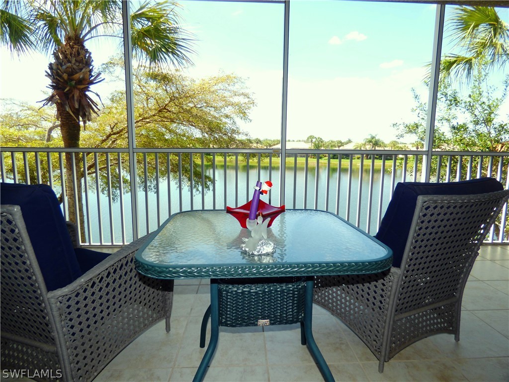 a view of a chairs and table on the deck