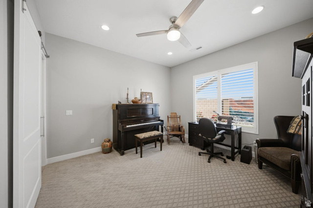 2829 East 1880th Street South St. George, UT 84790 - Photo 28 of 54 Office space with light carpet, ceiling fan, a barn door, and recessed lighting