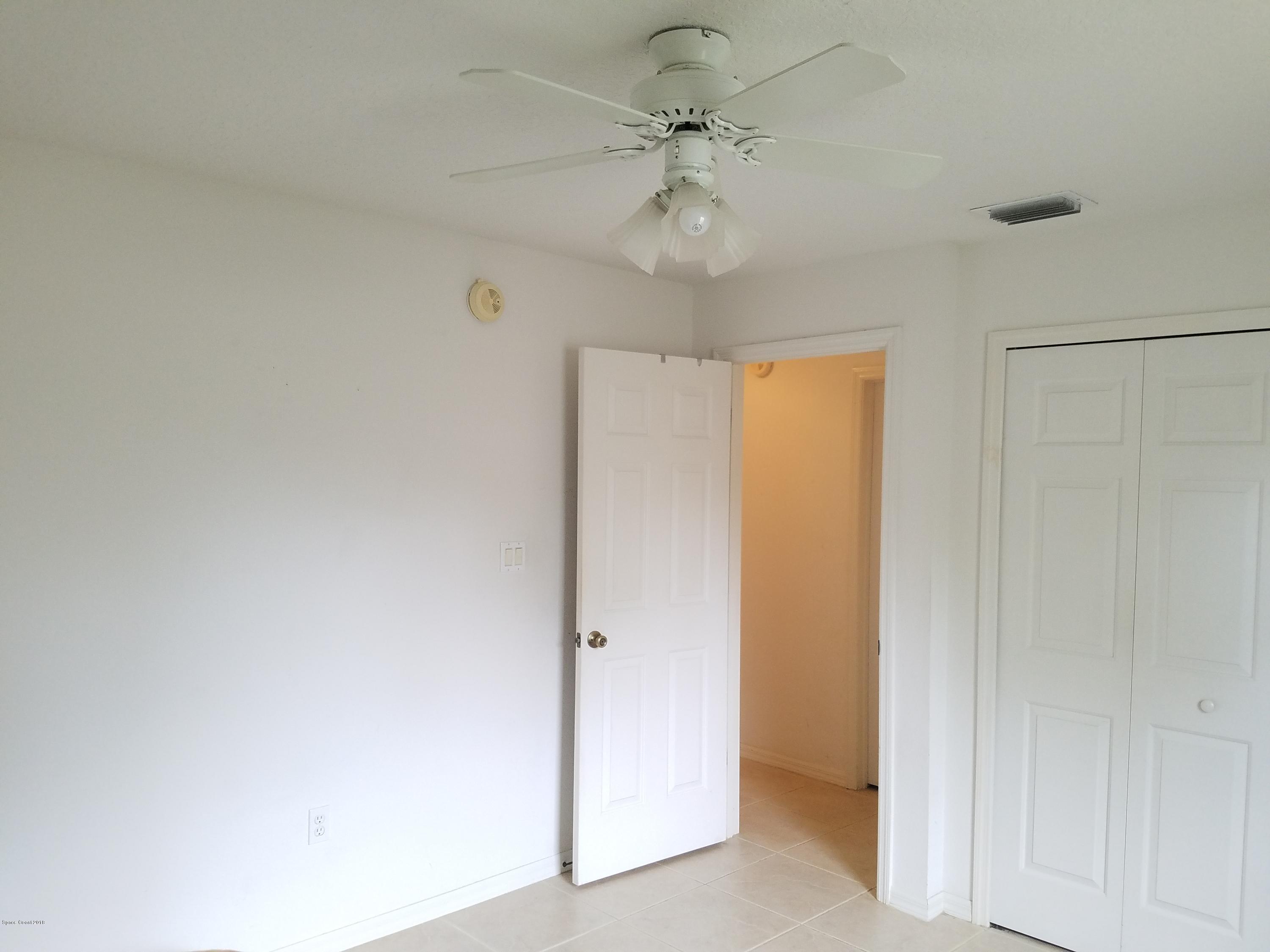 6157 Dees Road Cocoa, FL 32927 - Photo 14 of 20 a view of an empty room