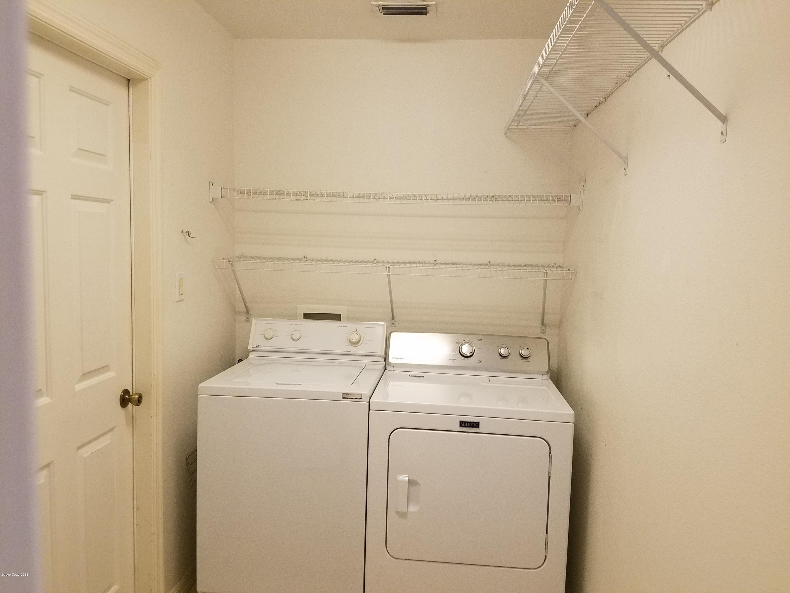 6157 Dees Road Cocoa, FL 32927 - Photo 17 of 20 a utility room with dryer and washer