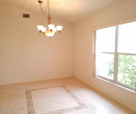 6157 Dees Road Cocoa, FL 32927 - Photo 7 of 20 a view of a room with a large window