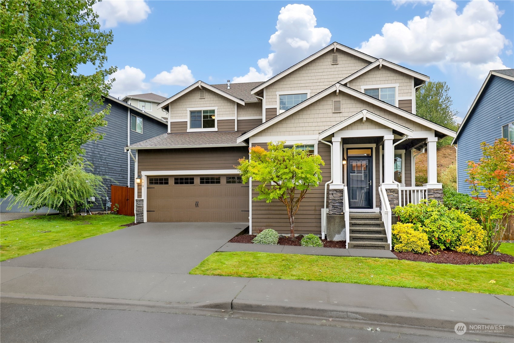 1592 Ridgeview Loop Southwest Tumwater, WA 98512 - Photo 1 of 40 a view of a house with a yard and large tree