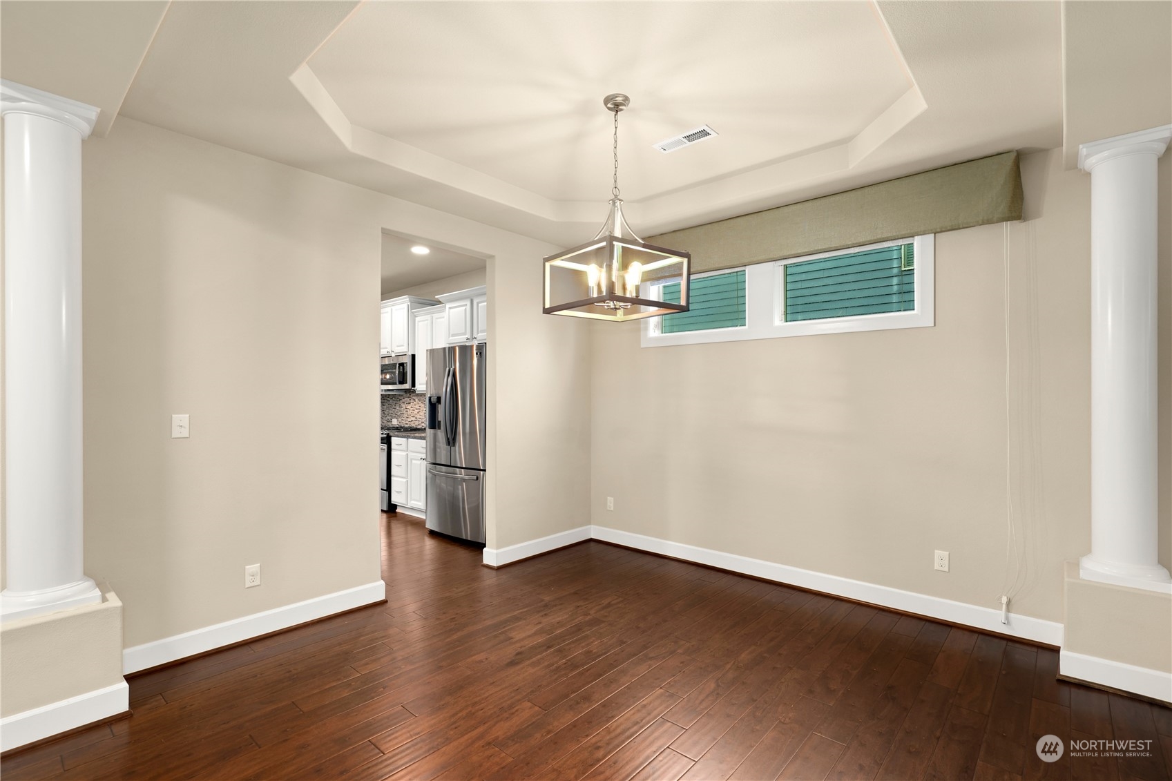 1592 Ridgeview Loop Southwest Tumwater, WA 98512 - Photo 15 of 40 a view of a kitchen with a refrigerator