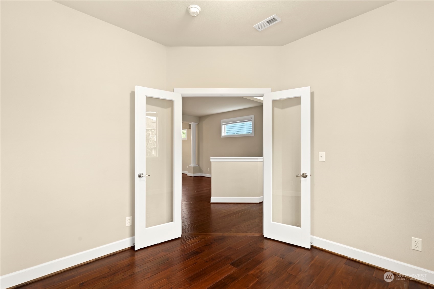 1592 Ridgeview Loop Southwest Tumwater, WA 98512 - Photo 16 of 40 a view of a hallway with wooden floor