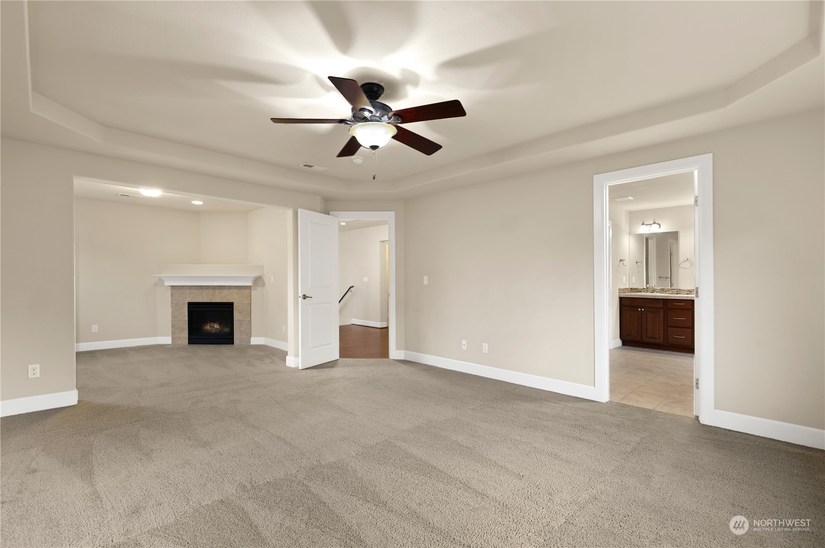 1592 Ridgeview Loop Southwest Tumwater, WA 98512 - Photo 21 of 40 a view of an empty room with a fireplace and a window