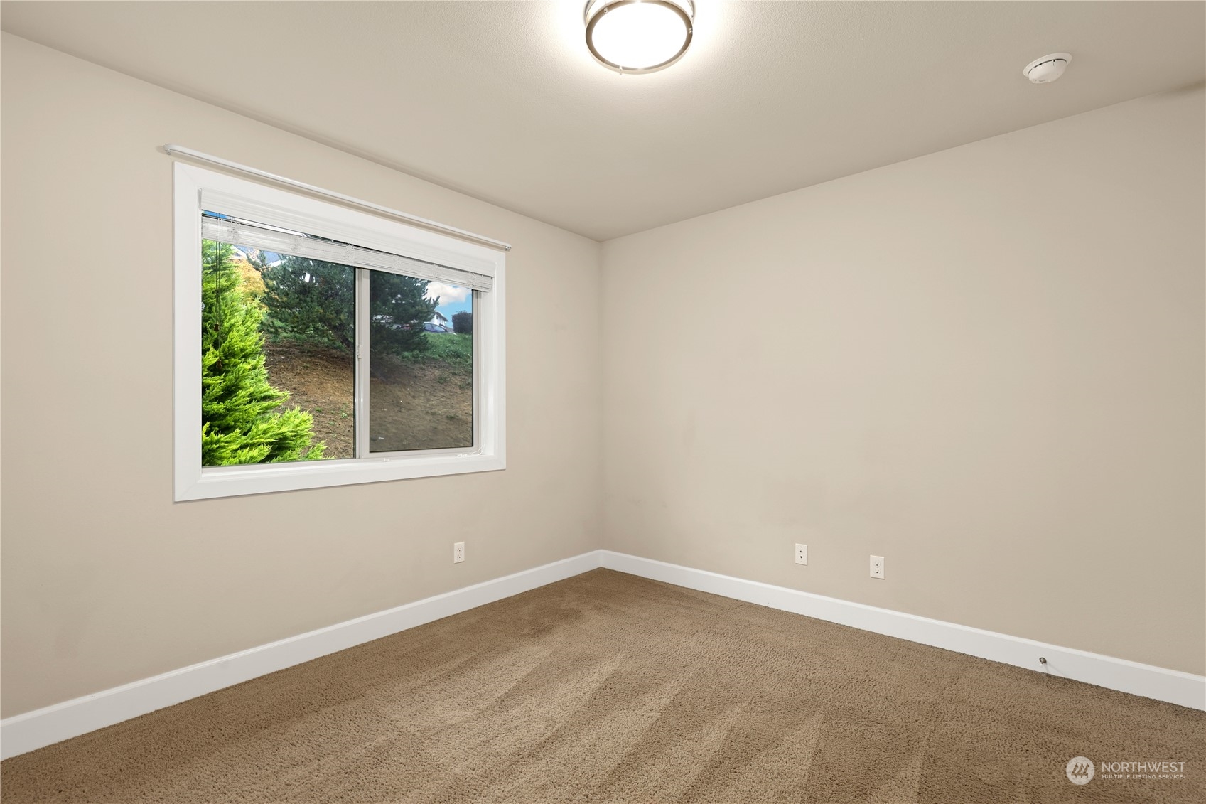 1592 Ridgeview Loop Southwest Tumwater, WA 98512 - Photo 33 of 40 an empty room with a window
