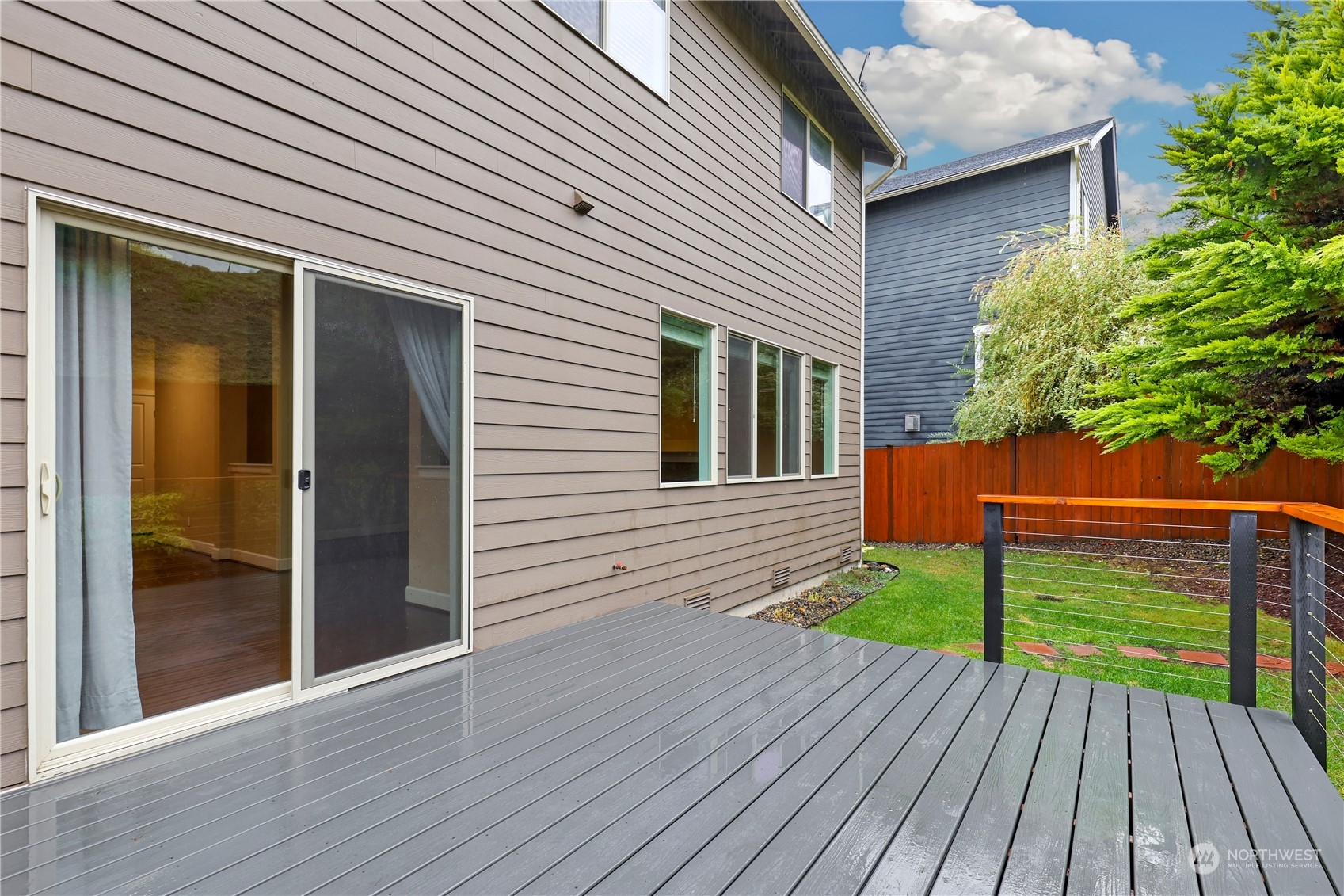 1592 Ridgeview Loop Southwest Tumwater, WA 98512 - Photo 36 of 40 a view of a backyard with wooden floor
