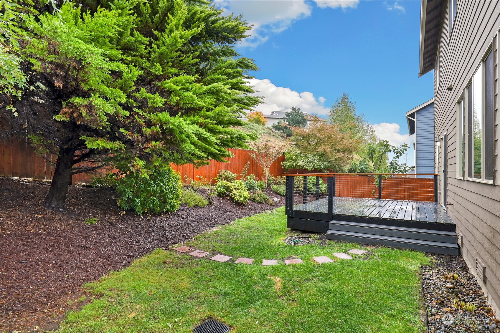 1592 Ridgeview Loop Southwest Tumwater, WA 98512 - Photo 37 of 40 a view of a bench in the garden