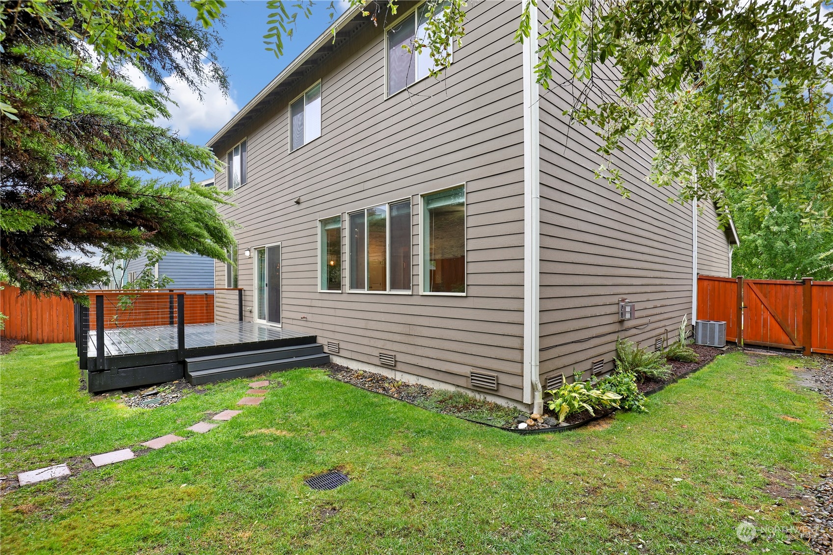 1592 Ridgeview Loop Southwest Tumwater, WA 98512 - Photo 38 of 40 a view of a back yard of the house