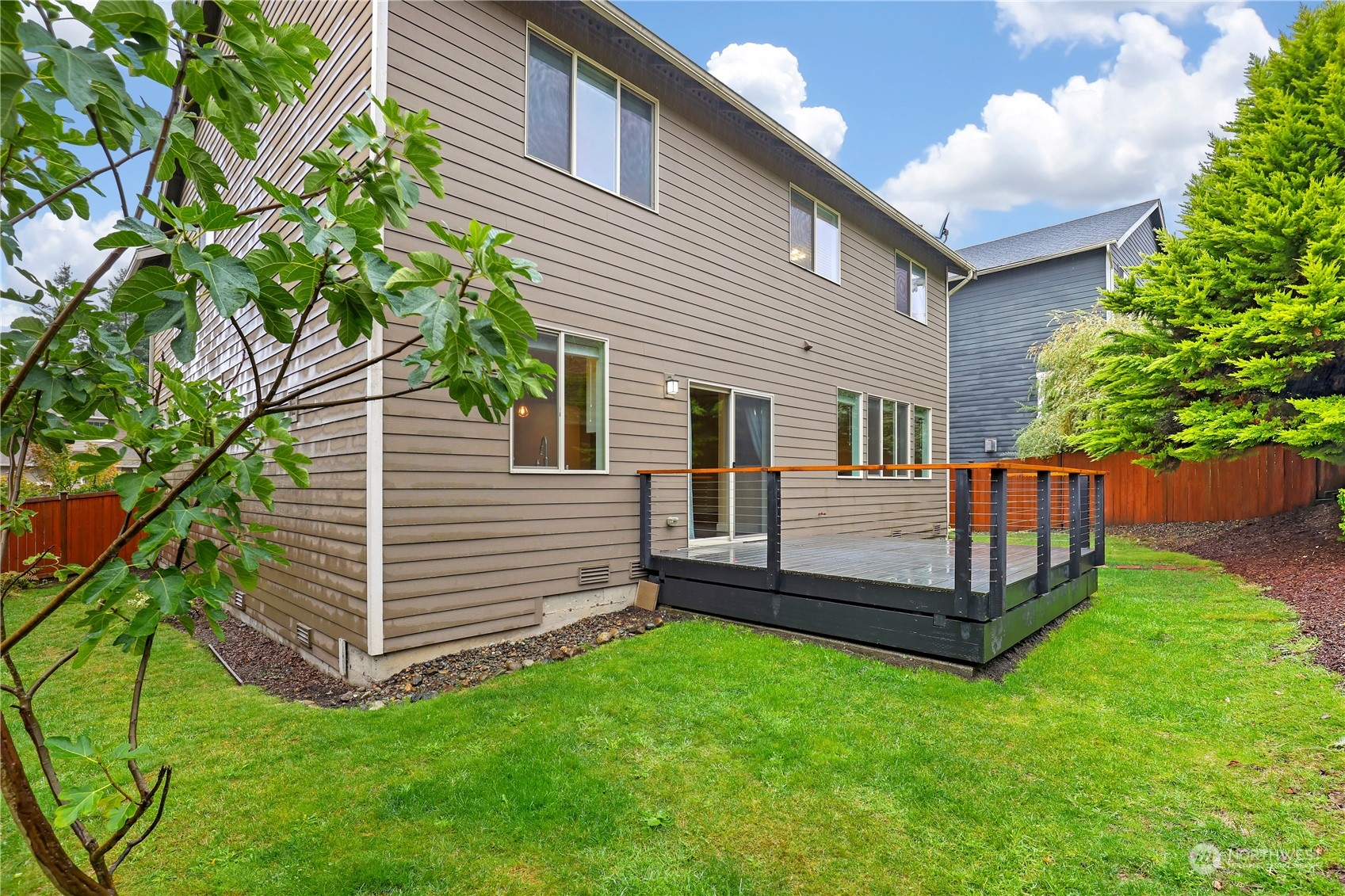 1592 Ridgeview Loop Southwest Tumwater, WA 98512 - Photo 39 of 40 a view of a house with a backyard