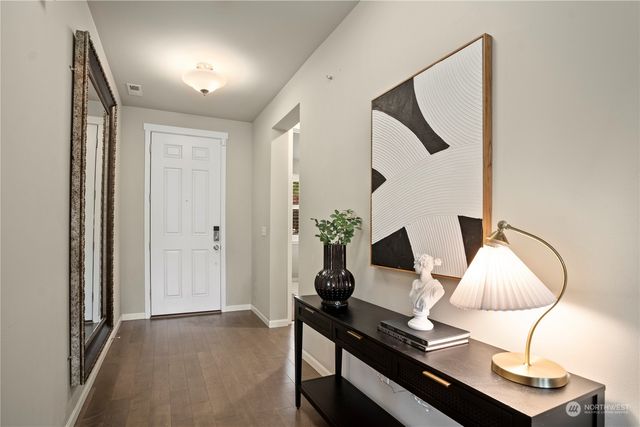a workspace with furniture and wooden floor