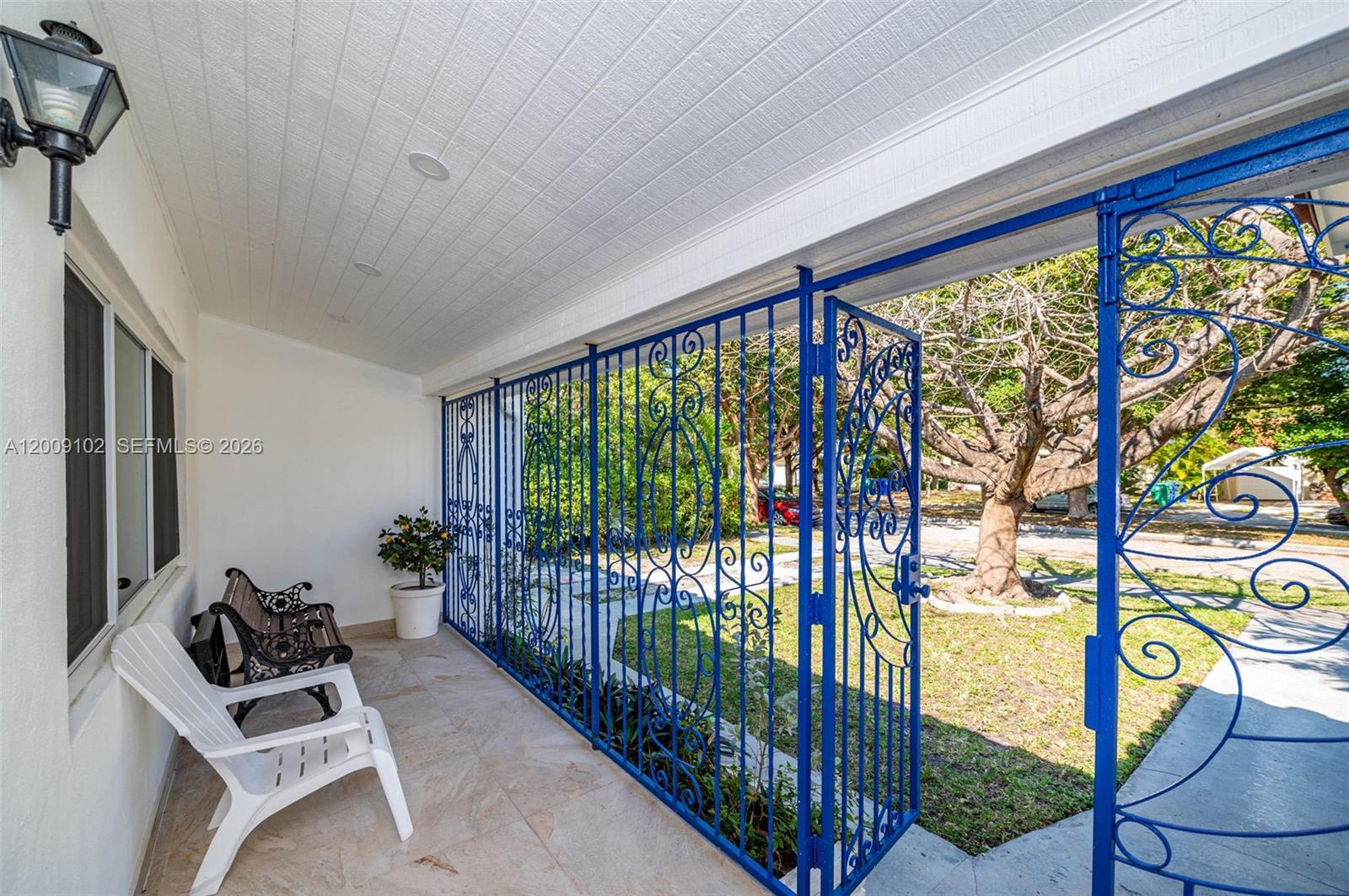 330 Southwest 27th Road Miami, FL 33129 - Photo 2 of 62 a view of a entryway with wooden floor