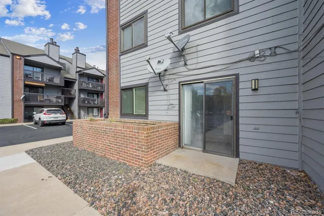 a front view of a house with parking