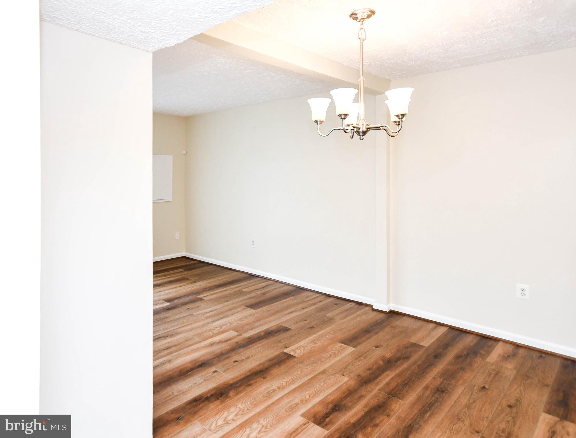 2115 North Anvil Lane Temple Hills, MD 20748 - Photo 12 of 37 a view of a chandelier in a room