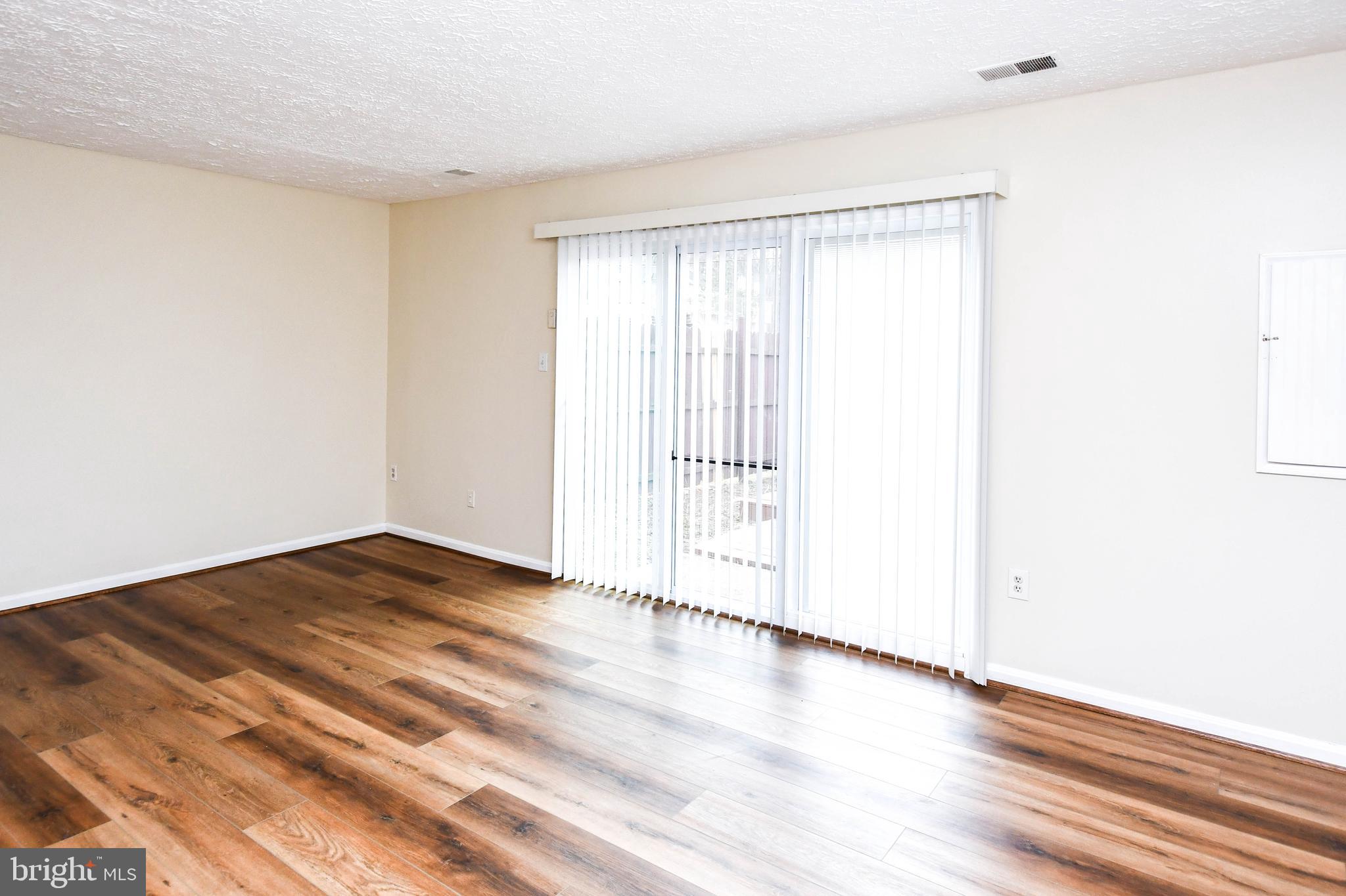 2115 North Anvil Lane Temple Hills, MD 20748 - Photo 16 of 37 a view of empty room with wooden floor