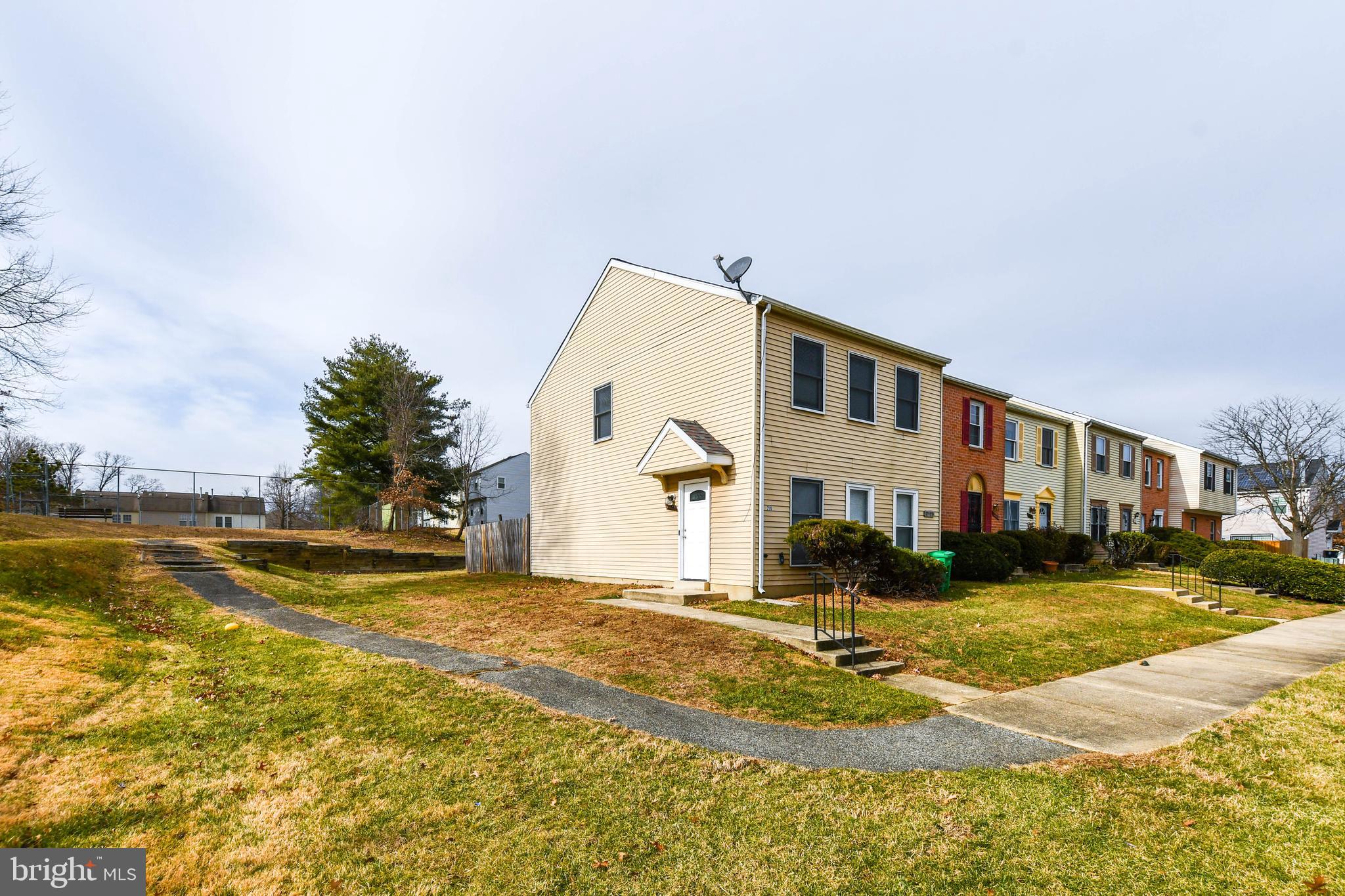 2115 North Anvil Lane Temple Hills, MD 20748 - Photo 35 of 37 a view of a house with a big yard and large trees