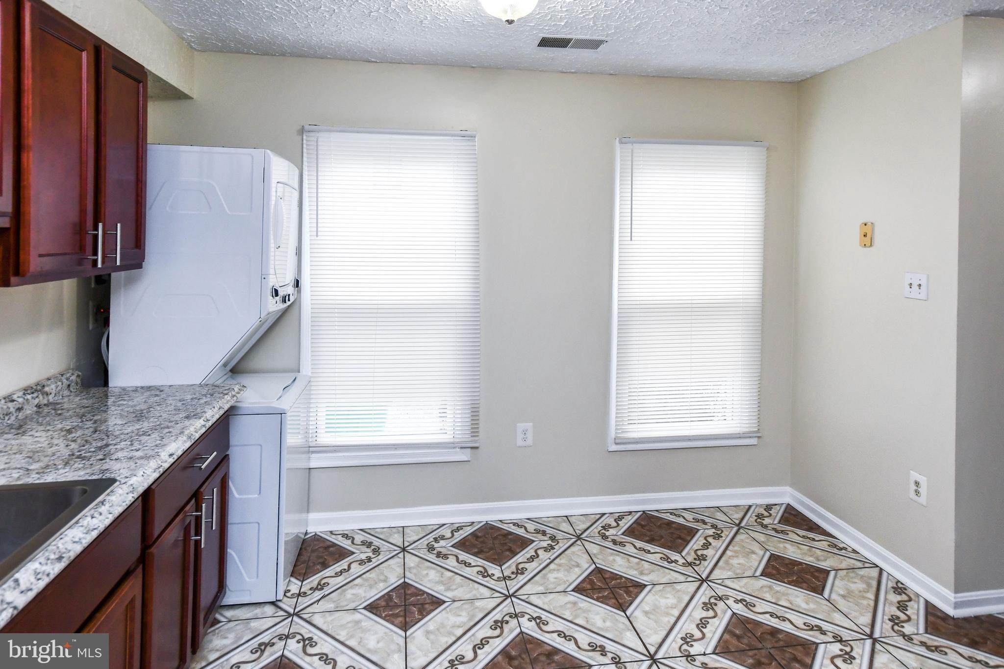 2115 North Anvil Lane Temple Hills, MD 20748 - Photo 10 of 37 a bedroom with a bed and a window