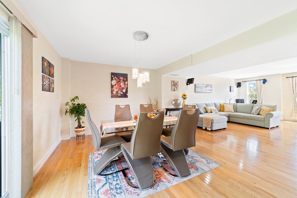 311 Littleton Road, Unit 60 Chelmsford, MA 01824 - Photo 15 of 42 a living room with furniture and a wooden floor