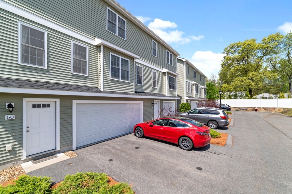 311 Littleton Road, Unit 60 Chelmsford, MA 01824 - Photo 2 of 42 a view of a car parked in front of a building
