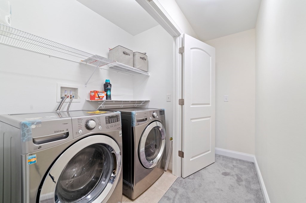 311 Littleton Road, Unit 60 Chelmsford, MA 01824 - Photo 35 of 42 a utility room with dryer and washer