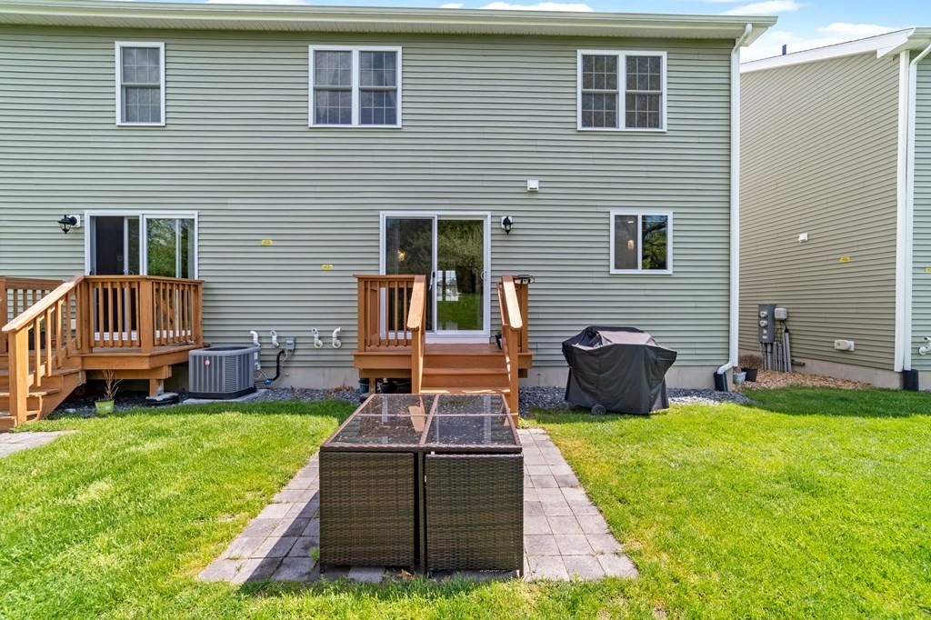 311 Littleton Road, Unit 60 Chelmsford, MA 01824 - Photo 41 of 42 a house view with a garden space