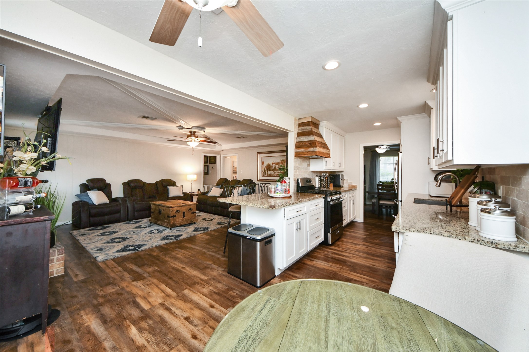 203 Ridgewood Drive Oak Ridge North, TX 77386 - Photo 15 of 39 a large white kitchen with lots of counter top space