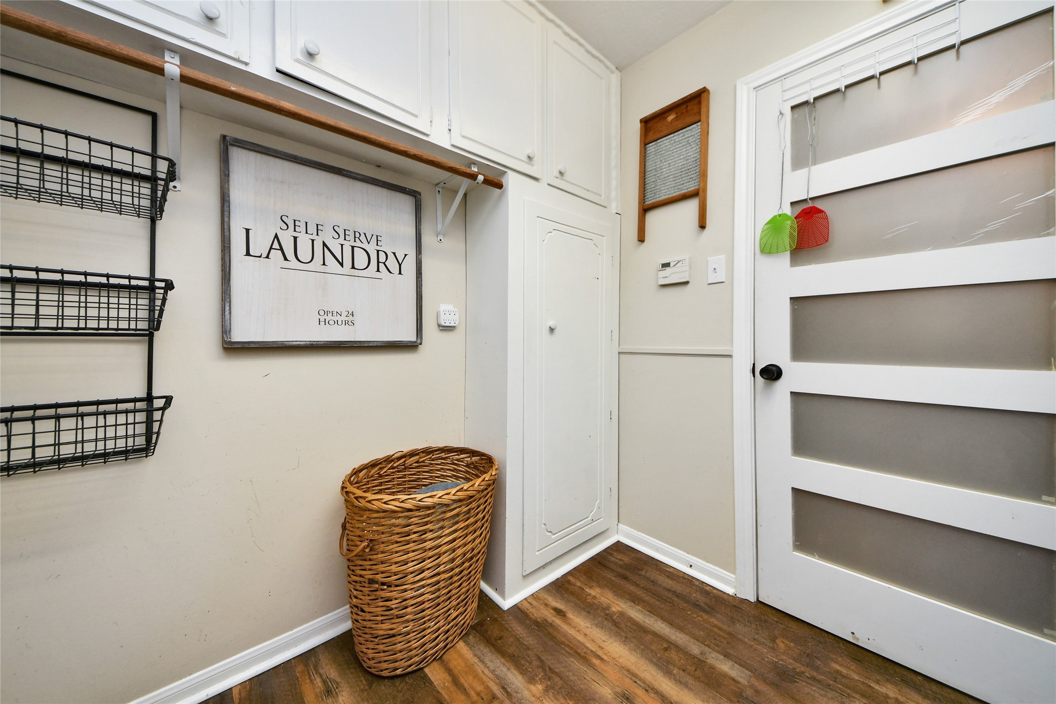 203 Ridgewood Drive Oak Ridge North, TX 77386 - Photo 17 of 39 a view of walk in closet with clothes and shoes