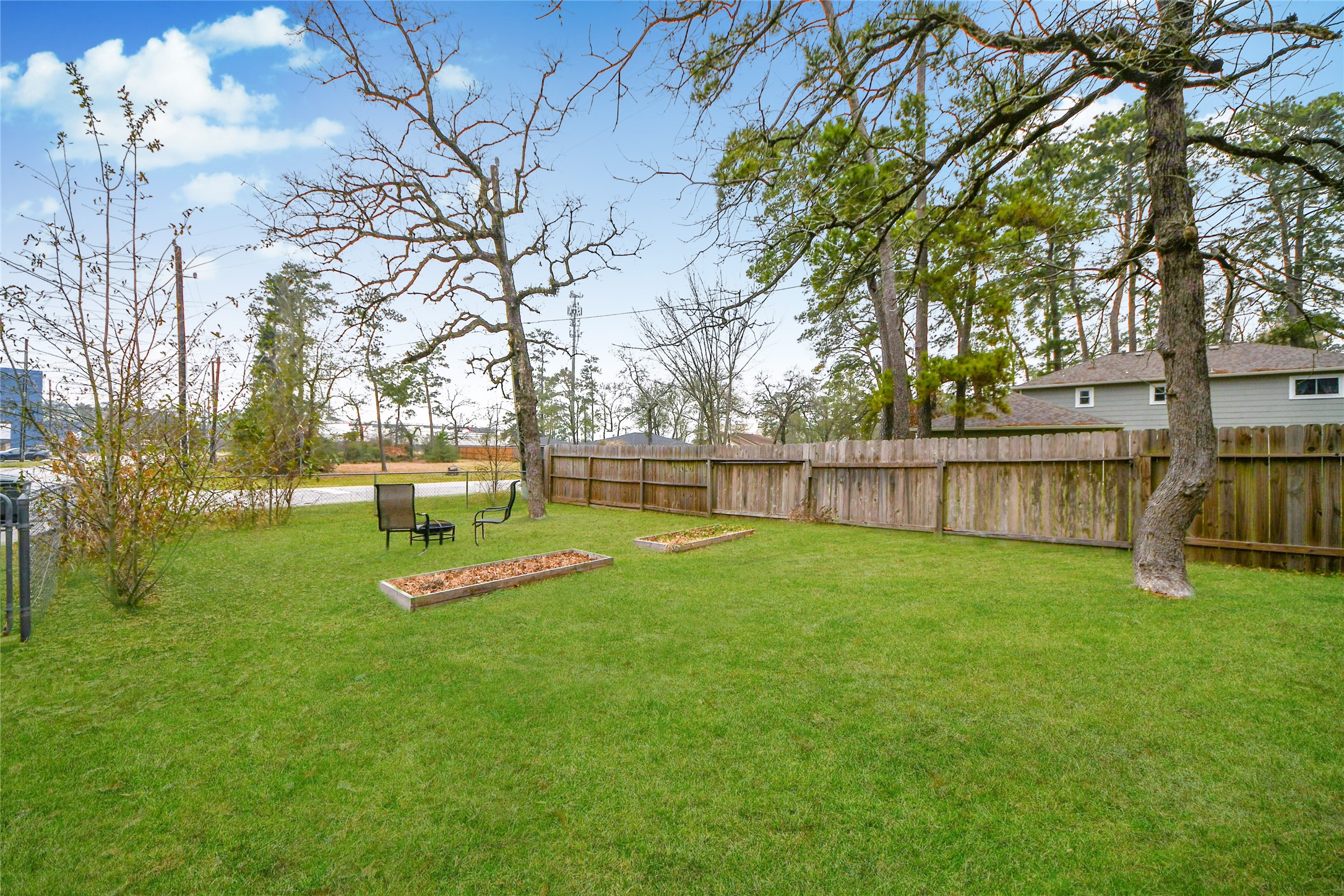 203 Ridgewood Drive Oak Ridge North, TX 77386 - Photo 37 of 39 a view of a park with trees