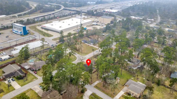 $330,000 | 203 Ridgewood Drive, Oak Ridge North, TX 77386
